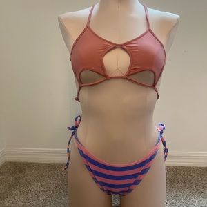 Pink and blue star top and striped bottom